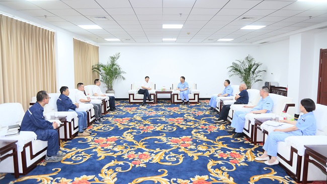 中電建河南工程有限公司黨委書記、董事長劉長龍一行到萬基控股集團交流訪談